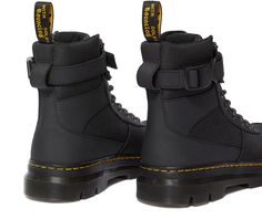 Step into unique style with the iconic Dr. Martens 1460 boot! Featuring 8 eyelets, classic smooth leather, and a comfortable air-cushioned sole. These boots are oil and fat resistant with great slip and abrasion resistance. Keep them clean and supple with Dr. Martens' Wonder Balsam. UK sizes listed on the shoe, US sizes with room to wiggle. Dr Martens Combs Tech, Gents Shoes, Fred Perry Shirt, Thick Socks, Baby Phat, M 4, High Leg Boots, Puma Fierce Sneaker, Black Ankle Boots