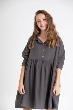 ‘A Week in Provence ‘ is the Miss Rose Sister Violet Spring / fall 2018 new clothing range and this gorgeous dress in heavy soft cotton is great to wear as either a top or dress .In two sizes S/mM/l Loose and so well made , it needs little ironing ( if any ) and is wash and wear easy to look after !! We wear it with our silky lace edged slip . Available in rose blush and charcoal . Spring Cotton Dresses With Rolled Sleeves, Fall Cotton Shirt Dress With Short Sleeves, Fall Shirt Dress With Rolled Sleeves For Daywear, Cotton Short Sleeve Shirt Dress For Fall, Fall Cotton Washed Dress, Fall Cotton Tunic For Loungewear, Oversized Cotton Dress With Buttons, Cotton Tunic For Daywear In Fall, Spring Cotton Washed Shirt Dress