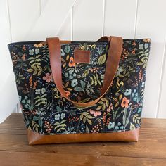 "The newly designed 'chubby' tote is larger than all other September Skye bags of recent years. It has a nice boxed bottom that sits nicely while filling with all your essentials: beach towels, books, makeup bags, sunscreen and more. The straps are made of genuine leather as well as the tag on the front. If you prefer to have a faux/vegan leather, please message me and I can arrange that. Specs: Approx. 18.5\" wide, 14\" tall, 5\" deep Approx, 12\"-13\" handle drop magnetic snap closure Leather Leather Travel Bag With Floral Print, Brown Leather Bag With Floral Print, Leopard Print Tote Bag With Adjustable Strap, Leather Tote Bag With Floral Print, Multicolor Floral Print Canvas Tote Bag, Patchwork Tote Bags, Tote Bag Aesthetic, Aesthetic Bags, Denim Handbags