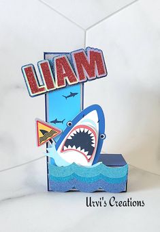 a card with a shark on it and the word i am written in large letters