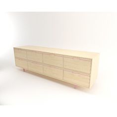 a large wooden cabinet with drawers on one side and pink tape on the other end