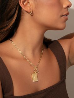 No initial necklace can make a statement quite like our Leave Your Mark Chain Necklace. Featuring a paperclip chain, toggle, and rectangle pendant, no one will forget you in this necklace. For a fully personalized look, shop our Initial Jewelry. | Leave Your Mark Chain Necklace GOLD / H Chic Toggle Necklace With Paperclip Chain As Gift, Trendy Paperclip Chain Jewelry With Initial Pendant, Trendy Initial Pendant Paperclip Chain Jewelry, Trendy Jewelry With Paperclip Chain And Initial Pendant, Trendy Initial Pendant Paperclip Chain, Trendy Toggle Necklace With Paperclip Chain Gift, Trendy Paperclip Chain Toggle Necklace For Gift, Trendy Toggle Necklace With Chain As Gift, Trendy Personalized Paperclip Jewelry