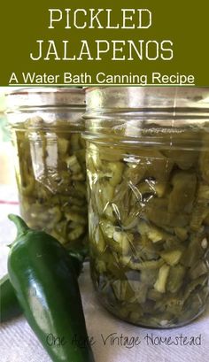 pickled jalapenos in jars on a table with green peppers and pepper