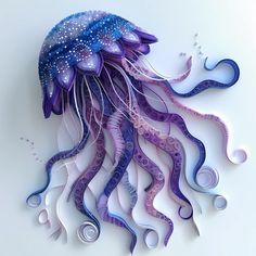 a paper cut out of a jellyfish with blue and purple swirls on it