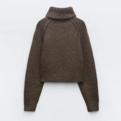 the turtle neck sweater is made from brown wool and features a high collar, long sleeves,