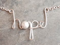 Hope Necklace, Birthstone Necklace, Silver Hope Necklace, Gold Hope Necklace, Swarovski Crystal Birthstone, Message Jewelry by JewelsbyJanine on Etsy https://www.etsy.com/listing/125319426/hope-necklace-birthstone-necklace-silver Wire Jewelry Making, Hope Necklace, Necklace Birthstone, Necklace Swarovski, Wire Work Jewelry