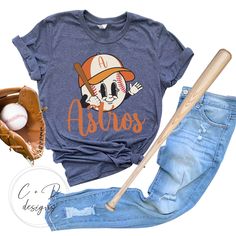 Super soft t-shirts custom made for Houston Astros Fans! Shirts are unisex providing a comfortable fit. If you would like a different color shirt than the options shown, please message us and we will work with you! *If you would like a name and number added to the back of your shirt jersey style, please see this add on listing: https://www.etsy.com/CamandDawnDesigns/listing/941346768/add-a-name-and-number-to-the-back-of?utm_source=Copy&utm_medium=ListingManager&utm_campaign=Share&utm_term=so.lmsm&share_time=1686498635882 Have a special request? Ask us! We'd be glad to help! ** If you are local to the Spring, TX area and would like to do a local pick up for free just use coupon code PICKUP when checking out and you won't be charged for shipping! PLEASE SEE SHOP ANNOUNCEMENTS FOR CURRENT PRO Astros T Shirt, Houston Astros Baseball, Astros Baseball, Baseball Outfit, Jersey Style, Baseball Shirt, Color Shirt, Baseball Shirts, Houston Astros