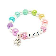 These adorable stretchy bracelets feature an enameled rainbow charm with happy and sad clouds, acrylic alphabet beads, resin rhinestone beads, a pastel rainbow of 10mm acrylic pearls and 8mm white acrylic pearls double strung with durable stretch floss cord. Enter the name one name you would like on each bracelet in the personalization box. Your bracelets will arrive in organza bags making them ready to give as gifts. Please message me if you have any questions or if you would like to make some Personalized Adjustable Rainbow Jewelry, Adjustable Personalized Rainbow Jewelry, Personalized Multicolor Charm Bracelet For Birthday, Personalized Rainbow Beaded Bracelets For Birthday, Personalized Rainbow Beaded Bracelet For Birthday, Cute Personalized Jewelry For Party Favors, Playful Rainbow Jewelry With Letter Beads, Customizable Adjustable Rainbow Jewelry, Personalized Playful Rainbow Jewelry