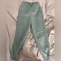 Nike Limited Time Pistachio Green Xs Joggers - Never Worn, 100% Polyester, Adjustable Toggle, 2 Large Mesh Pockets, Cuffed Ankles, Totally Water Resistant. 1 Small Undetectable Oil Stain Above Nike Swoosh Spring Athleisure Green Pants, Spring Green Athleisure Pants, Green Workout Joggers With Elastic Waistband, Green Joggers With Elastic Waistband For Workout, Nike Green Sportswear Bottoms, Nike Green Athleisure Joggers, Green Sports Bottoms For Spring, Green Joggers With Elastic Waistband For Gym, Green Activewear With Elastic Waistband For Spring