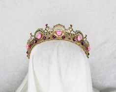 VALENTINE GOLD AND PINK HEART FILIGREE CROWN Brass findings are handstitched to a crown base Painted Gold Embellished with glass gemstones and plastic beads Comfortable and flexible Fits all head sizes from children to adults. ---- One size fits all - bobby pins can easily be used for added securing Beaded Crown, Heart Crown, Pink Crown, Pink Stones, Headpiece Jewelry, Soul Mates, Gold And Pink, Angel Art, Fantasy Jewelry