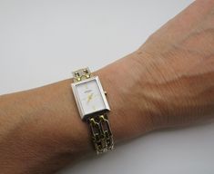 (b8) Vintage two tone bi metal Dress Watch with a nice clear white rectangle dial By Rotary Quartz watch from the late 90s early 00s No matter if you are looking to buy a watch for yourself or as a present, a vintage  piece is always the best choice!  No longer in production,  Tested over 48hrs and working to correct time with no issues. cleaned it will hold it's value, and may even increase in price. Don't hesitate! Will fit  7.1" approx  can be downsized with link removal. Vintage light age re Rectangle Watch, Watch Womens, Metal Dress, White Rectangle, Watch Gift, Late 90s, Clear White, Dress Watch, Women Wrist Watch