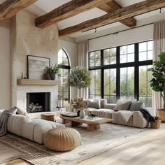 a living room filled with furniture and a fire place in front of a large window