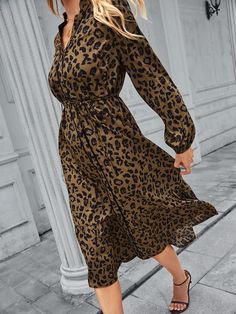 Fall in love with the flirty and fierce Lilacoo Leopard Print Babydoll Dress. The dress is crafted from sheer chiffon, adorned with a trendy leopard print, creating a bold and stylish look. The V-neckline with covered buttons, long sleeves with buttoned cuffs, and a seamed waist add a touch of elegance and sophistication to the dress. The classic babydoll silhouette is finished with a ruffled mini hem, adding a playful and feminine touch to the dress. Be wild and confident in this stunning dress Chic Leopard Print V-neck Midi Dress, Leopard Print Long Sleeve Midi Dress, Chic Long Sleeve Leopard Print Dress, Chic Leopard Print Midi Dress, Leopard Print V-neck Party Dress, Brown Chiffon V-neck Dress, Elegant Leopard Print V-neck Midi Dress, Chic V-neck Leopard Print Midi Dress, Casual Leopard Print V-neck Midi Dress