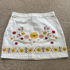 H&M Floral Skirt With Silver Back Zipper. Woven Floral Print On The Front. Great, Brand New Condition! Waist: 14 In. Length: 15 In. Spring Bohemian Cotton Mini Skirt, Bohemian Cotton Mini Skirt For Spring, Embroidered Yellow Cotton Bottoms, Yellow Embroidered Cotton Bottoms, Yellow Embroidered Summer Bottoms, Embroidered Cotton Mini Skirt For Summer, Yellow Bottoms With Floral Embroidery For Summer, Yellow Floral Embroidery Bottoms For Summer, Yellow Embroidered Bottoms For Summer