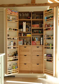 an open pantry with lots of food in it