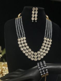 "Step into a world of opulence with our High-Quality Chandbali Choker and Kundan Necklace Set, a symphony of elegance and craftsmanship. This exquisite ensemble seamlessly blends the charm of Punjabi, Pakistani, and Indian styles, offering a unique fusion of tradition and modernity. 💖🌟 The Chandbali Choker exudes regality, while the Kundan Necklace Set adds a touch of grace and sophistication. Each piece is meticulously crafted to be more than just jewelry--it's a symbol of refined taste and s Elegant Jewelry Sets With Round Beads For Diwali, Silver Kundan Necklace With Jewels For Festivals, Silver Kundan Necklace With Meenakari And Round Beads, Silver Bridal Necklace With Jewels For Festivals, Silver Meenakari Round Bead Jewelry, Silver Beaded Chandbali Bridal Necklace, Silver Polished Beads Jewelry For Celebration, Silver Beaded Temple Jewelry Sets, Traditional Silver Jewelry Sets With Round Beads