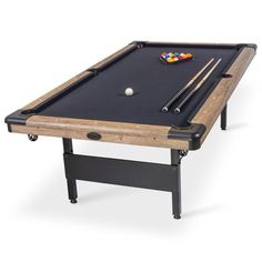 a pool table with two cues and balls on the top, in front of a white background