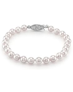 This beautiful Akoya pearl bracelet ranges between 6.0-6.5mm in size and consists of beautiful and lustrous pearls in AA+ quality. The option to upgrade to AAA quality pearls are available for an additional fee. All pearls in this bracelet are round and are strung with silk thread and double-knotted between each pearl. This bracelet comes standard with a beautiful 14K gold clasp, though premium clasps can be selected for an additional cost.
Known as the 'icon' of cultured pearls, Akoya pearls h Luxury Pearl White Classic Pearl Bracelet, Luxury White Adjustable Pearl Bracelet, Cheap White Round Bead Bracelets, Akoya Pearl Bracelets In Pearl White With Round Beads, Formal Pearl Bracelet With Round Beads, Single Strand Akoya Pearl Bracelet In Pearl White, Classic Pearl White Bracelet, Elegant Akoya Pearl Bracelet In Pearl White, Pearl Jewlery