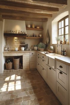 a kitchen filled with lots of counter top space next to a stove top oven and sink