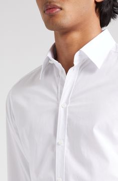 A smart wardrobe essential, this Italian-crafted shirt is cut from pure cotton poplin for a crisp look and easy movement. 30" length; 40 1/2" chest (size 40) Raised placket Point collar Long sleeves with button cuffs 100% cotton Machine wash, line dry Made in Italy Designer Clothing Elegant Long Sleeve Poplin Shirt, Modern Cotton Dress Shirt With Concealed Placket, Elegant Button-up Poplin Shirt, White Poplin Button-up Shirt, Classic Long Sleeve Poplin Dress Shirt, Elegant Poplin Shirt With Button Cuffs, White Poplin Shirt For Work, Modern Shirt With Spread Collar For Daywear, Modern Cotton Dress Shirt For Daywear