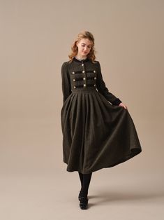 Green Winter Dress With Button Closure, Winter Workwear Midi Dress With Ruffles, Green Vintage Midi Dress For Fall, Vintage Green Midi Dress For Fall, Wool Buttoned Workwear Dresses, Vintage Buttoned Midi Dress For Fall, Vintage Midi Dress With Buttons For Fall, Vintage Knee-length Midi Dress For Winter, Winter Wool Dresses With Buttons