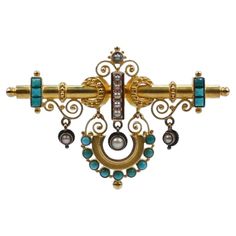 A very fine Victorian Etruscan Revival brooch. In 14k gold with both filigree decoration and granulated and wire work decoration throughout. It is bezel set with small turquoise cabochons and seed pearls. Suspended from the top bar is an arc with bezel set round turquoise cabochons and three pearl set pendants. Simply a finely made Revivalist brooch! Date: 19th Century Overall Condition: It is in overall good, as-pictured, used estate condition with some very fine & light surface scratches and o Victorian Gold Brooches With Jewels, Ornate Yellow Gold Brooch For Ceremonial Use, Ornate Yellow Gold Brooches For Ceremonial Use, Ornate Yellow Gold Brooches For Ceremonial Occasions, Ornate Gold Brooches With Jewels, Ceremonial Yellow Gold Brooch With Intricate Design, Victorian Jeweled Gold Brooches, Luxury Gold Brooches With Intricate Design, Ornate Jeweled Gold Brooches