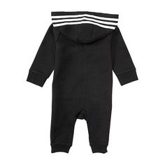 Introduce your little one to classic adidas style in these baby coveralls. The adidas Badge of Sport and 3-Stripes give it a timeless look that never gets old. The hood pops up for extra warmth, and the French terry makes it feel extra cozy.Closure Type: ZipperNeckline: Hooded NeckPockets: 1 Front Kangaroo PocketSleeve Length: Long SleeveSleeve Style: Cuffed SleeveApparel Length: 100 InchesFiber Content: 100% CottonFabric Description: French TerryCare: Machine WashCountry of Origin: Imported Sporty Cotton Onesie For Loungewear, Sporty Cotton Long Sleeve Onesie, Sporty Long Sleeve Cotton Onesie, Adidas Baby, Baby Unisex, Adidas Fashion, Jumpsuit Black, Black Bedding, Long Sleeve Jumpsuit