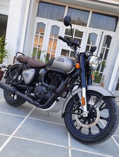 a motorcycle parked in front of a building