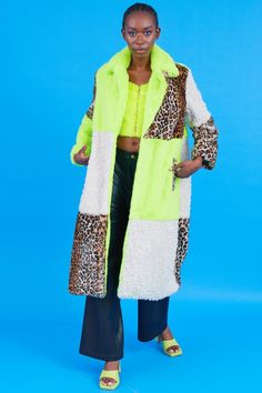 Who doesn't love animal print and when combined with a bright bold green and white shearling, it's easy to see why our latest arrival is such a big hit. This coat features an extra fluffy faux fur collar in bright blue, oversized classic lapels, pockets, leopard print and Shearling Check Design and full silk lining.   15% Acrylic 85% Modacrylic Lining: 100% Viscose Fur Gloves, Long Faux Fur Coat, Leather Coat Jacket, Fur Headband, Fur Bag, Maxi Coat, Print Coat, Green Coat, Faux Fur Collar