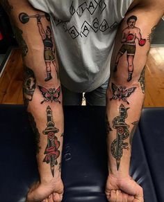 a man with many tattoos on his arms