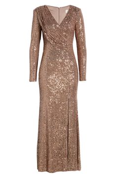 Best paired with a glass of something sparkling, this draped gown is designed to turn heads. 58" length (size 8) V-neck Long sleeves Lined 95% polyester, 5% spandex Dry clean Imported Elegant Mermaid Dress, Sleeve Gown, Mermaid Sequin, Trumpet Gown, Sequin Prom Dress, Long Sleeve Gown, Maxi Dress Prom, Sequin Maxi Dress, Tulle Gown