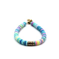 A blue colorful heishi bead bracelet is the perfect on-trend accessory to top off your look. It is a great stand alone bracelet and works well as a stack bracelet, too. This non-stretch bracelet features blue, pink, yellow, and turquoise polymer clay heishi beads with gold brushed metal beads in the center, all hand-strung onto flexible jewelry wire. The bracelet is finished off with a lobster clasp, and a 1" extender chain to accommodate various wrist sizes. MATERIALS Polymer Clay & Metal Beads Trendy Blue Heishi Beaded Bracelets, Trendy Blue Heishi Beads Bracelets, Trendy Blue Heishi Bead Friendship Bracelets, Trendy Turquoise Heishi Beads Jewelry, Trendy Blue Heishi Beads Jewelry, Multicolor Heishi Beads Stretch Bracelet, Heishi Bead Bracelet, Yellow And Turquoise, Colorful Bracelet