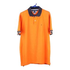 Vintage orange Tommy Hilfiger Polo Shirt - mens x-large Casual Orange Collared T-shirt, Classic Orange Short Sleeve Shirt, Orange Collared Cotton Polo Shirt, Classic Orange Collared Top, Orange Cotton Collared Polo Shirt, Classic Orange Collared Shirt, Orange Cotton Short Sleeve Polo Shirt, Tommy Hilfiger Polo Shirt, Tommy Hilfiger Polo