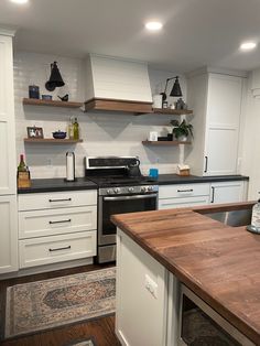 the kitchen is clean and ready for us to use in its new owner's home