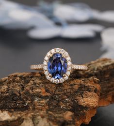 This is such a pretty Art Deco ring. Set on a solid gold band with a raised gallery, this exceptional ring features a stunning oval cut blue sapphire. The beautiful and translucent gemstone measures approx 6mm x 8mm and is surrounded by a halo of some very lively round cut white stones which sparkle magnificently as they catch the light. The ideal blend of high quality and stunningly beautiful design is within your grasp with this Hidden Halo Floral Blue Sapphire Engagement Ring. ❤ Ring Sizes: A Oval Sapphire Ring With Halo Setting In 14k Gold, Oval Sapphire Ring With Halo, Heirloom Rose Gold Oval Sapphire Ring, Oval Halo Ring Stamped 14k Fine Jewelry, Oval Stamped 14k Halo Ring Fine Jewelry, Rose Gold Oval Ring Stamped 14k, Rose Gold Oval Diamond Ring Stamped 14k, Classic Oval Rose Gold Sapphire Ring, Oval Rose Gold Diamond Ring Stamped 14k