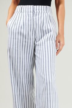 Look good in the Arlah Striped Pleated Pants! Comfortable and with a subtle stripe throughout shapes these essential high-waisted pants that boast belt loops, a hidden zip fly with top closure, and a pleated style. Don’t forget to add on the matching oversized blazer for a complete look.- Striped- Wide leg- High waisted- Lined- Color: Navy StripeSize + Fit - Model is 5'8" and wearing size XS- Measurements taken from size S - Waist: 14 3/4"- Inseam: 30 1/4" Fabric Self:65%Polyester 35%Cotton Lini Pleated Pants, Oversized Blazer, Navy Stripes, High Waisted Pants, Wide Leg, Fitness Models, High Waisted, Navy, Blazer