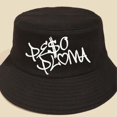 Peso Pluma bucket hat / sombrero tipo pescador/ copa Peso Pluma  embroidered/ bordado You can choose color of font/ puedes eligir el color de lo escrito. size 59cm circumference Summer Bucket Hat With Letter Print And Wide Brim, Summer Wide Brim Bucket Hat With Letter Print, Summer Bucket Hat With Letter Print And Curved Brim, Beach Bucket Hat With Letter Print, Casual Black Bucket Hat With Letter Print, Spring Bucket Hat With Letter Print, Trendy Streetwear Bucket Hat With Letter Print, Casual Bucket Hat With Letter Print, Black Bucket Hat With Letter Print