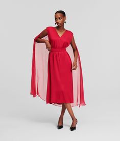 Elegantly draped in viscose satin, this sleeveless V-neck dress showcases a dramatic cape, infusing grace into every stride. Its timeless silhouette is accentuated by in-built shoulder pads and a versatile, detachable waistbelt topped with KARL Autograph logo embroidery. Midi Dress For Women, Heel Accessories, Timeless Dress, Blouse Jeans, Rock Chic, Sleepwear & Loungewear, Logo Embroidery, Dress For Women, V Neck Dress