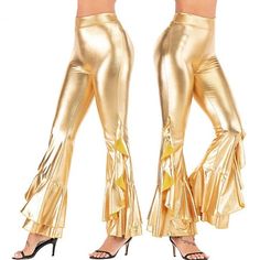 two women wearing gold pants and high heels