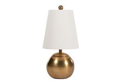 a gold table lamp with a white shade on the base and a light bulb attached to it