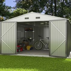 a metal shed with two bicycles in it