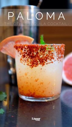 a close up of a drink in a glass on a table