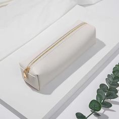 These beautiful pencil pouches are both stylish and functional. Material: PU Leather Gold Colored Hardware size: 8.6” x 4.3” x 2.3” Cute Pencil Case For School, White Pencil Case, Room Necessities, Cute Pencil Pouches, Pencil Pouches, Pretty School Supplies, Teachers Thanksgiving, School Suplies, Handbag Making