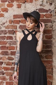 "♥ EXPRESS worldwide shipping - buy your favorite piece today and wear it within just 1-3 days upon shipping ♥ This beautifully tailored black gothic dress will make you feel like a true underground princess. Minimalist design, gorgeous criss-cross double straps, and floor-length are just some of the piece's magical features. We thought about your comfort as well - stretchy fabric and every girl's favorite dress hack - pockets! Be Love ♥♥ ♥ Available sizes: XS - XL For more info, check my Size C Black Witchy Dress For Alternative Fashion, Black Grunge Mini Dress For Halloween, Black Mini Dress For Spring With Alternative Style, Black Emo Mini Dress For Alternative Fashion, Emo Black Mini Dress For Alternative Fashion, Black Mini Dress For Halloween Concert, Emo Style Black Mini Dress For Alternative Fashion, Black Grunge Dress For Alternative Fashion, Black Mini Dress For Summer Concerts