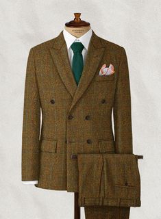 Tweed is indeed stepped in tradition, but it can easily translate to right here, right now, with the proper tailoring know-how. Our Harris Tweed Highland Rust Double Breasted Suit crafted from wool fabric is tactile, soft, breathable, adaptable and exudes a warm feel. The rustic suit combines the textured weave with a contemporary tailored fit and throws in precise plaids to take the suit to a fresh level that’ll work from days at the office to special occasions in cooler weather. 
 
 Look Inclu Luxury Bespoke Tailored Tweed Jacket, Rust Suit, Rust Pants, Grey Tweed Suit, Tweed Fashion, Rust Fabric, Herringbone Tweed Jacket, White Linen Suit, Green Velvet Jacket