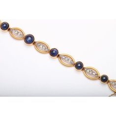 Beautiful 18k yellow gold bracelet featuring oval links with Rose cut diamond bars connected by cabochon sapphire buttons.  Please see the measurements noted above in the description for best approximate dimensions Diamond Bar, Yellow Gold Bracelet, Art Deco Era, Rose Cut Diamond, Rose Cut, Diamond Cuts, Gold Bracelet, Sapphire, Yellow Gold