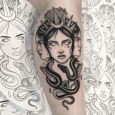 a woman's face with two snakes on her leg