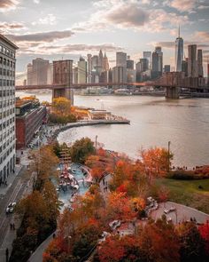 an aerial view of the city skyline and river