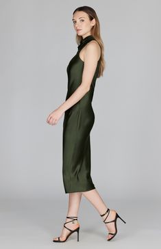 A classic bias cut dress with an elegantly draped high cowl neck. This sleeveless dress is cut in a flattering tea length with a clean baby hem finish. This dress is unlined and needs only a back neckline keyhole closure thanks to the nature of bias cut fabric. Sleek Sleeveless Midi Dress For Formal Occasions, Silk Midi Slip Dress With Side Slits, Sleeveless Silk Slip Dress With Side Slits, Formal Sleek Slip Dress With Cowl Back, Elegant Sleeveless Dress With Side Slits For Night Out, Classic Silk Sleeveless Maxi Dress, Sleeveless Sleek Maxi Dress With Flattering Silhouette, Sleek Sleeveless Maxi Dress With Flattering Silhouette, Sleek Silk Dress With Bias Cut For Evening