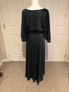 This amazing designer 1960's 70's Katja of Sweden Emerald green runway movie star godess dress comes to you in a size XS-small. Please compare the measurements i give you to those in your closet -13 inches waist- -57 inches top of shoulder to bottom of dress- -hips 22 1/2 -zips up back -below waist where belt is are a couple of pull marks -only 2 you might see because belt covers 70s Green Dress, Bell Sleeve 70s Dress, 60s Bell Sleeve Dress, Fitted 1970s Style Green Maxi Dress, Green Runway, 1970s Green Long Sleeve Dress, Black Leather Vest, Vintage Harley Davidson, Vintage Harley